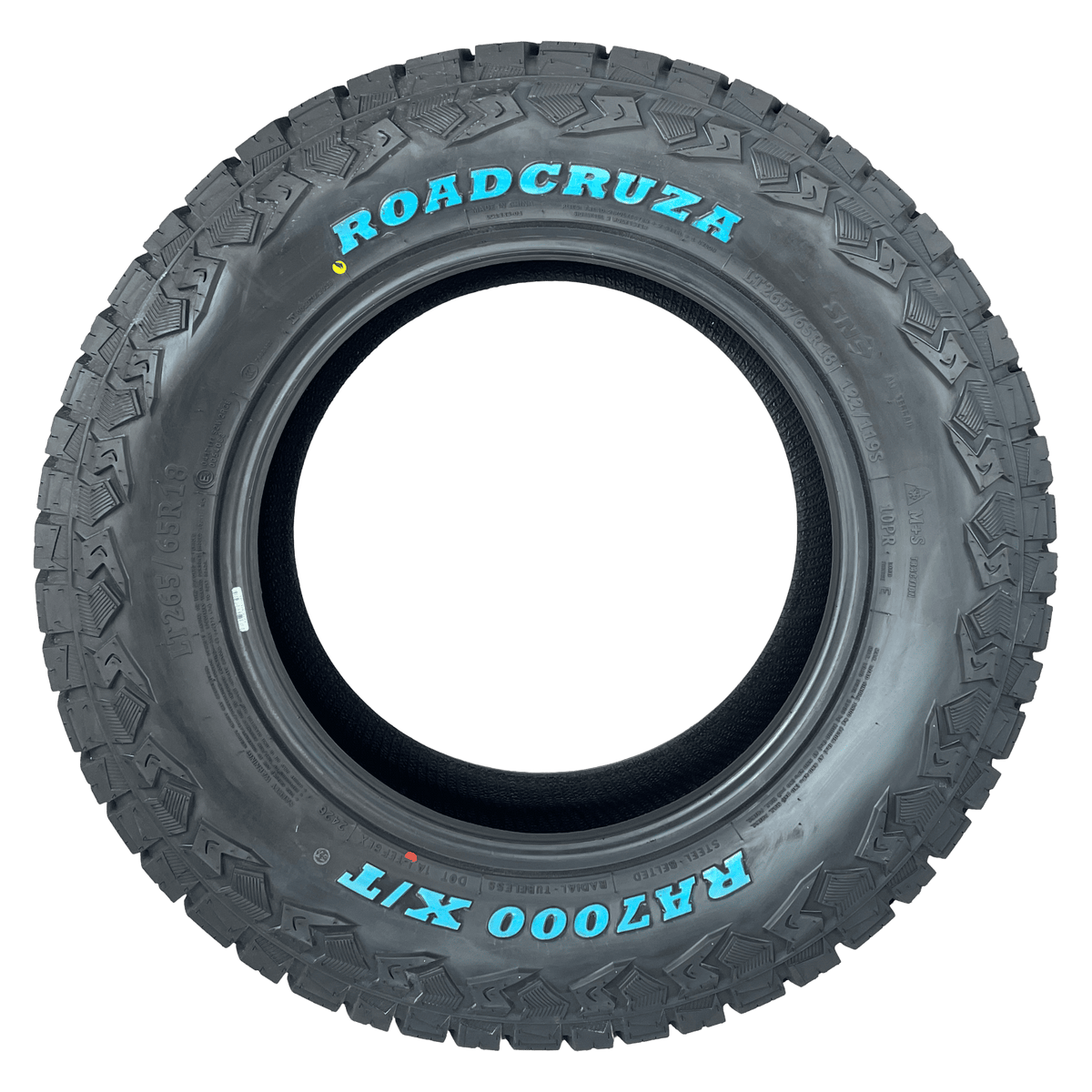 A single black all-terrain tyre with aggressive tread, featuring the brand name 'ROADCRUZA' and model 'RA7000 XT' printed in bright cyan blue on the sidewall, isolated on a white background.