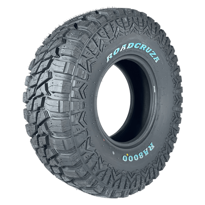A black all-terrain tire with aggressive tread blocks, featuring the brand name 'ROADCRUZA' and model 'R38000' printed in light blue on the sidewall, shown on a solid white background.